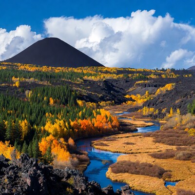 Volcanic cone over autumn river valley
