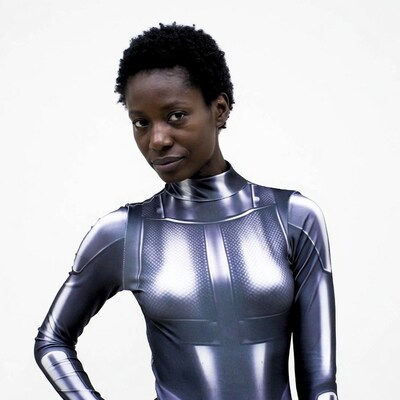 African-American woman in metallic bodysuit