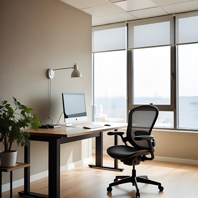 Modern office desk with iMac and chair