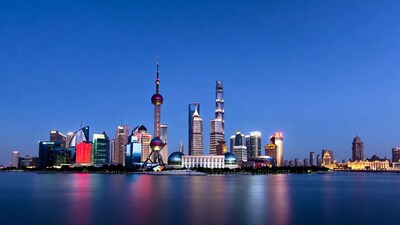 Shanghai skyline at night with reflections