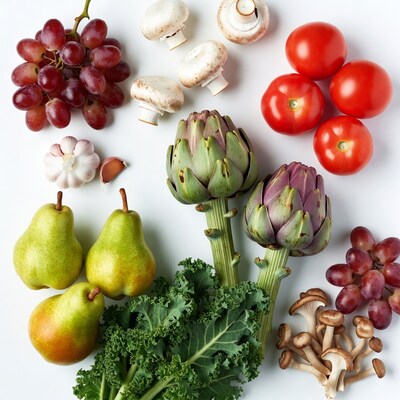 Fresh vegetables and fruits on white background