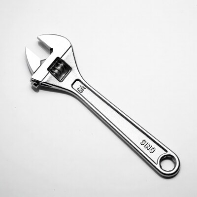 Silver adjustable wrench isolated
