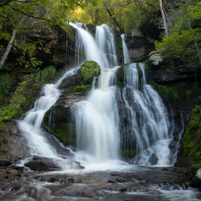 Mossy Multi-Tiered Waterfall in Forest