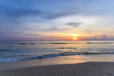 Sunset over ocean beach