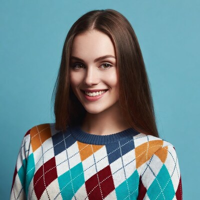 Smiling woman in colorful argyle sweater