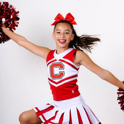Cheerleader girl with pom poms