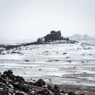 Rocky Hill in Snowy Tundra