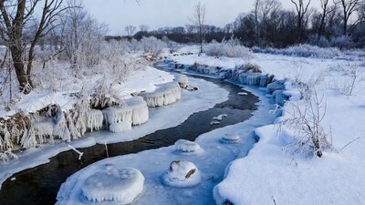 Frozen River with Icicles and Snowy Trees