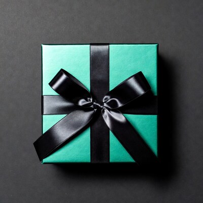 Teal gift box with black ribbon