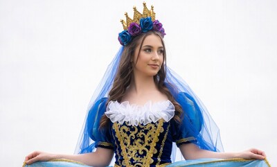 Woman in blue gown with gold crown