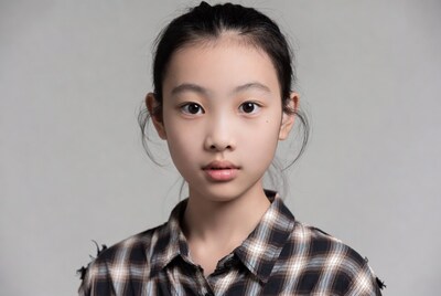 Asian girl in plaid shirt portrait