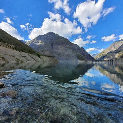 Mountain Dam Over Reservoir with Reflections
