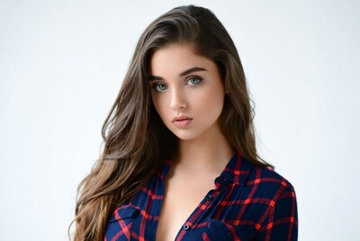 Woman in plaid shirt close-up