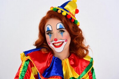 Clown woman with red hair smiling