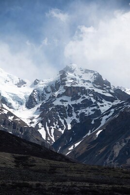 Snowy Mountain Peaks with Clouds