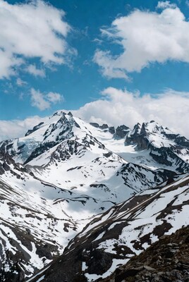 Snowy Mountains Under Blue Sky