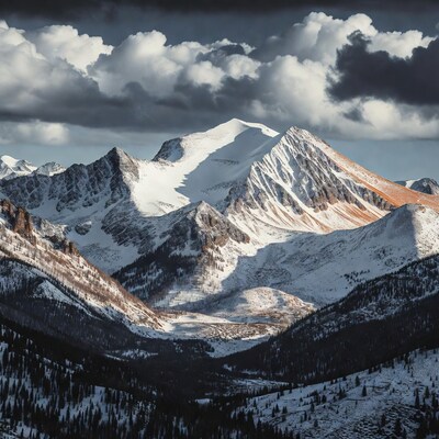 Snowy Mountain Peaks with Clouds