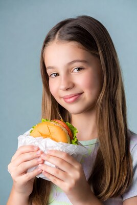 Girl holding burger