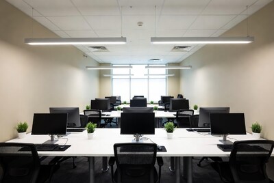 Empty modern office cubicles with computers