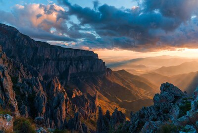 Dramatic Sunset Over Rugged Mountains