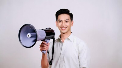 Asian man holding megaphone