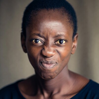 African woman making duck face