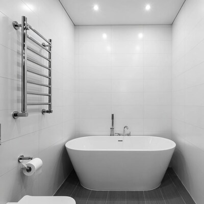 Modern white bathroom with freestanding bathtub