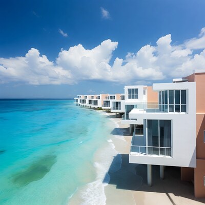 Modern overwater villas on turquoise beach