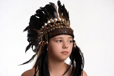 Girl wearing Native American headdress