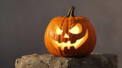 Lit Jack-o-Lantern on Rock