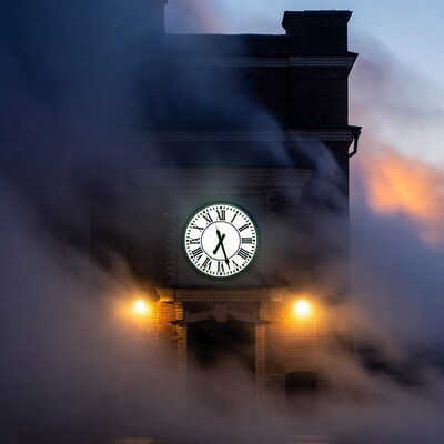 Foggy Clock Tower at Dusk