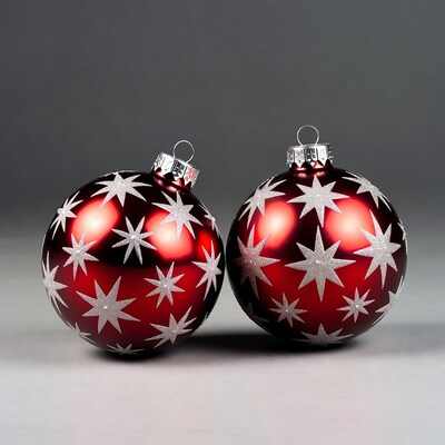 Two red star Christmas ornaments