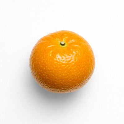 Fresh mandarin orange on white