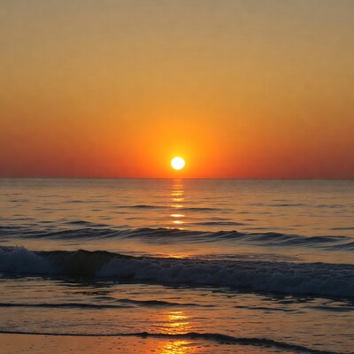 Sunset over ocean waves