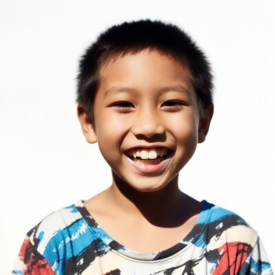 Asian boy smiling brightly