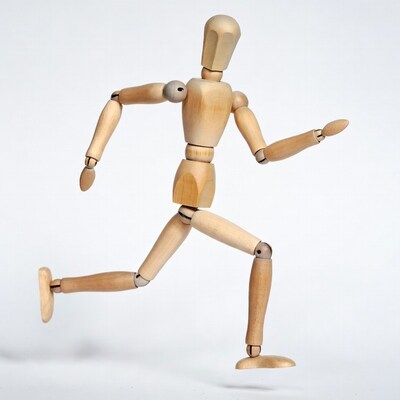 Wooden artist mannequin running