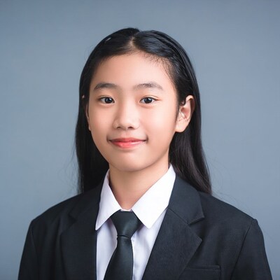 Asian girl in school uniform smiling