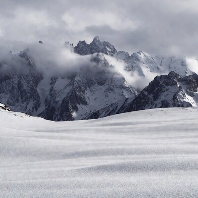 Snowy Mountains with Clouds