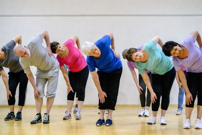 Group of seniors doing side bends