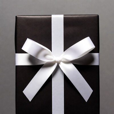 Black gift box with white bow