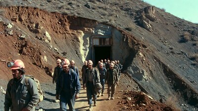 Miners entering mine tunnel