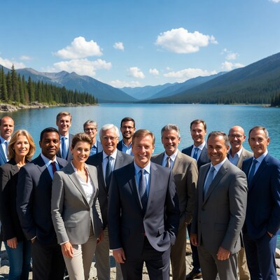 Business team by mountain lake