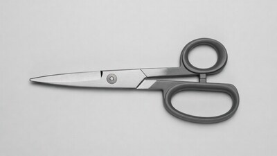 Large silver scissors isolated background