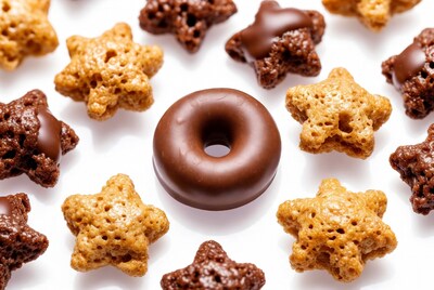 Chocolate donut with star-shaped cereal
