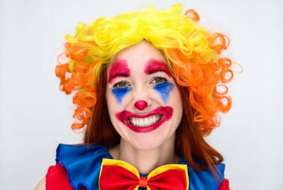 Woman in colorful clown costume