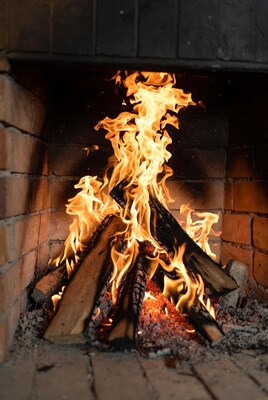 Blazing Fire in Brick Fireplace