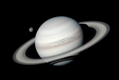 Saturn with rings and moon