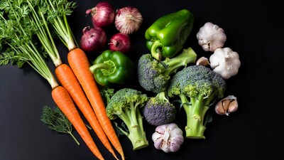 Fresh vegetables on black background