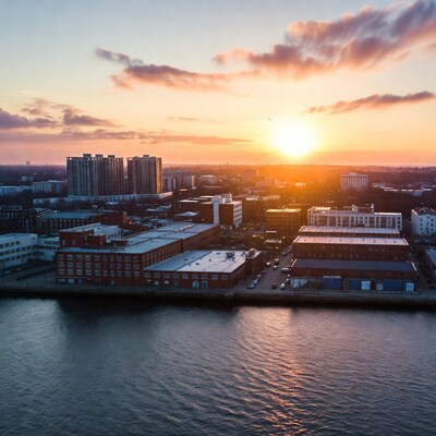 Urban Sunset Over Waterfront Buildings