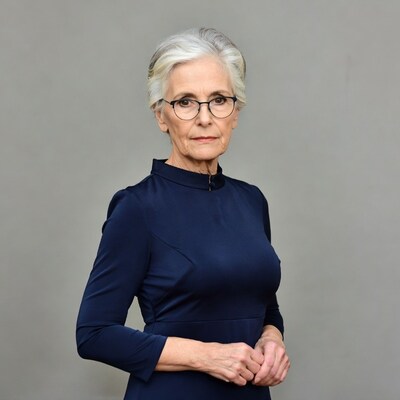 Elderly woman in navy dress